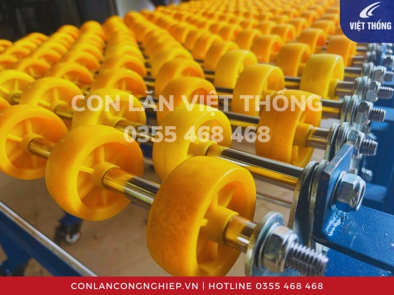 Bánh xe con lăn nhựa băng tải