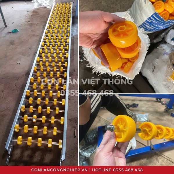 Thang lăn hàng bánh xe nhựa